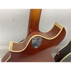 Eastern eight-string mandolin with sunburst finish and mother-of-pearl inlay L68.5cm; and another Harmony mandolin with cracked headstock (2)