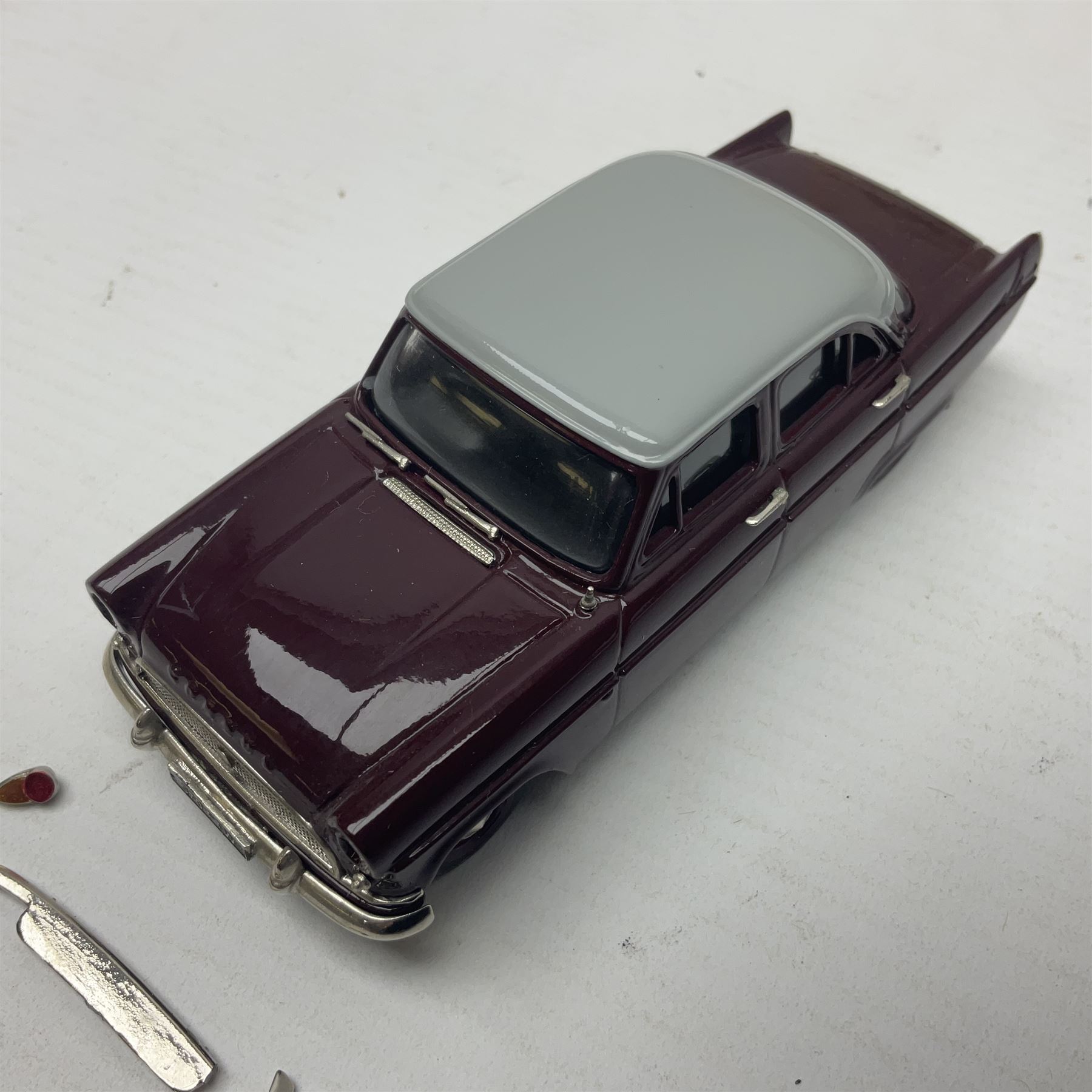 Four Lansdowne Models 1:43 scale models - 1956 Hillman minx Series 1 (Pearl grey over Fiesta blue); 1957 Hillman Husky Series 1 (Seacrest green/foam grey); 1960 Ford Consul MkII (Imperial maroon/smoke grey); and 1972 Vauxhall Ventora 3300 MkII; all boxed (4)