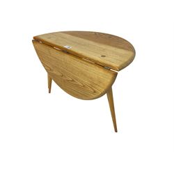 Ercol - elm and beech '308 Folding Occasional Table', circular top with gate-leg and splayed tapering supports