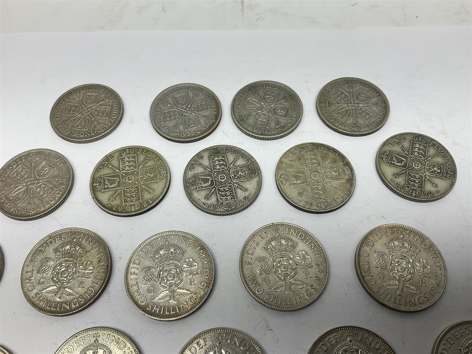 Approximately 260 grams of Great British pre 1947 silver two shillings coins 