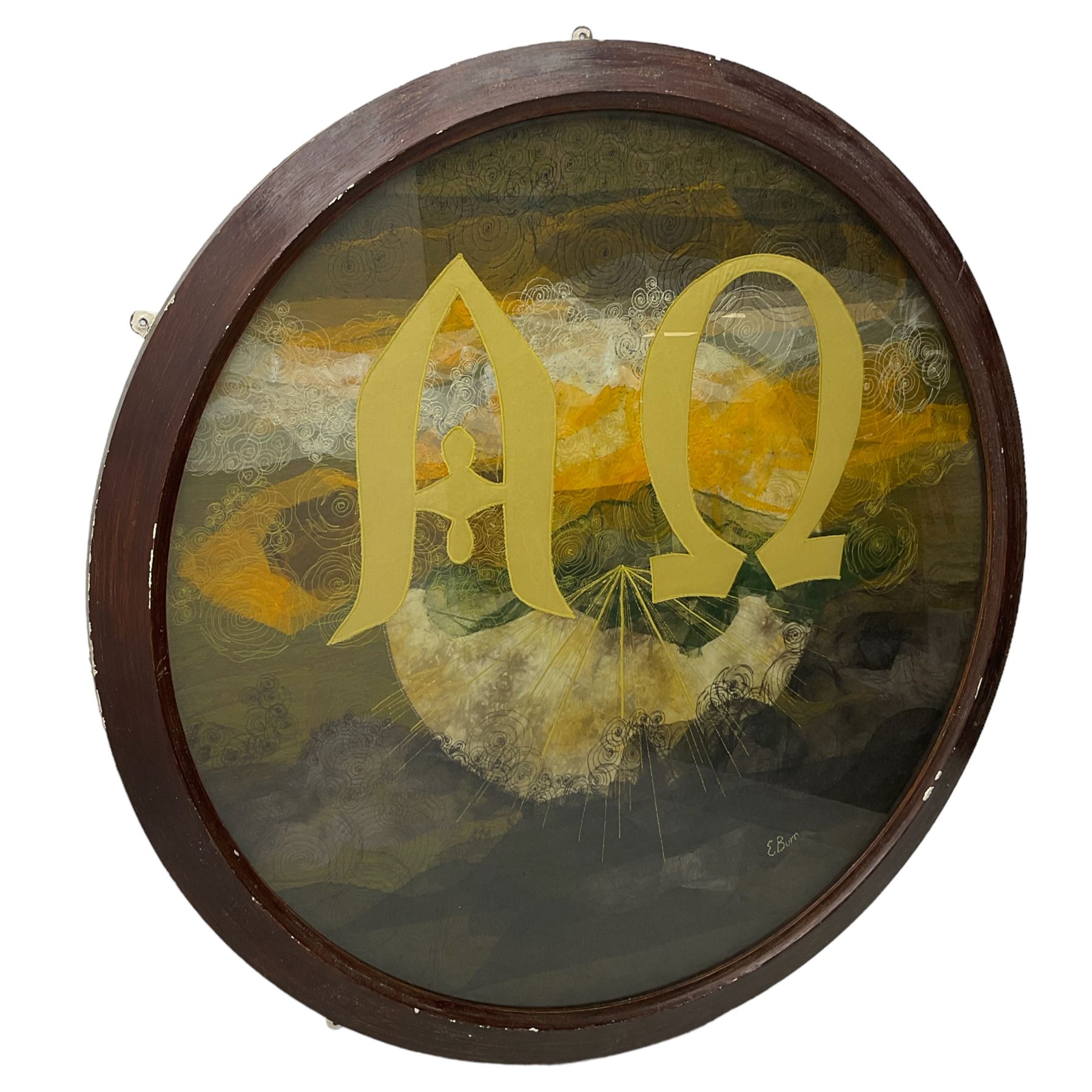 Circular needlework panel depicting Alpha and Omega symbols upon a sunset landscape scene with raised gilt stitching in wooden frame, signed ‘E. Burn’ in thread