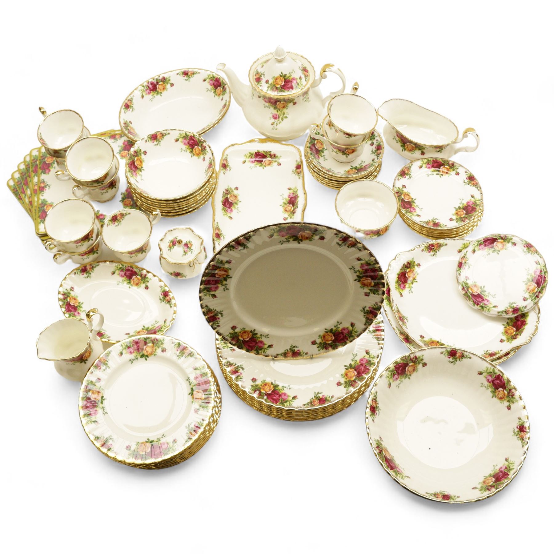Royal Albert Country Roses tea and dinner service, teapot, milk jug, covered sucrier, eight dinner plates, eight teacups and saucers 