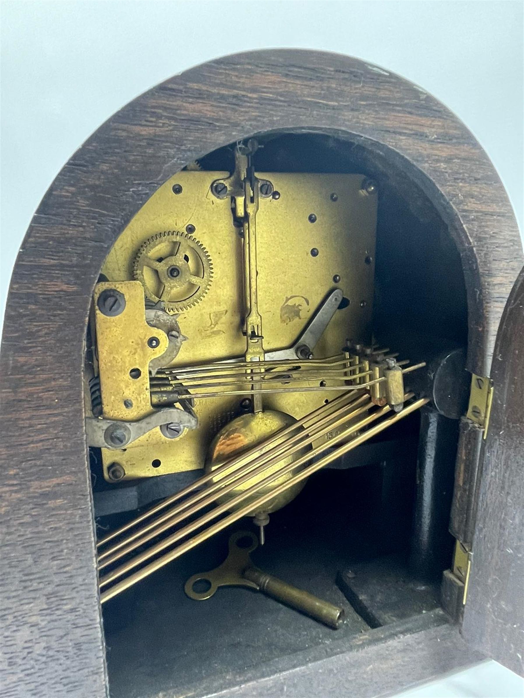 Early to mid 20th century oak mantel clock, silvered Arabic dial, triple train driven quarter Westminster chiming movement