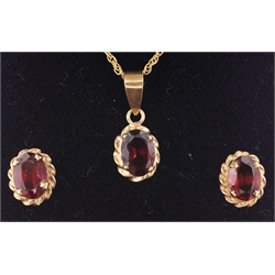 Gold garnet pendant necklace and pair ear-rings ensuite stamped 9ct  