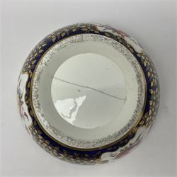19th century continental bowl, decorated with hand painted floral sprays amongst gilt foliate decoration on a cobalt blue ground, D27.5cm
