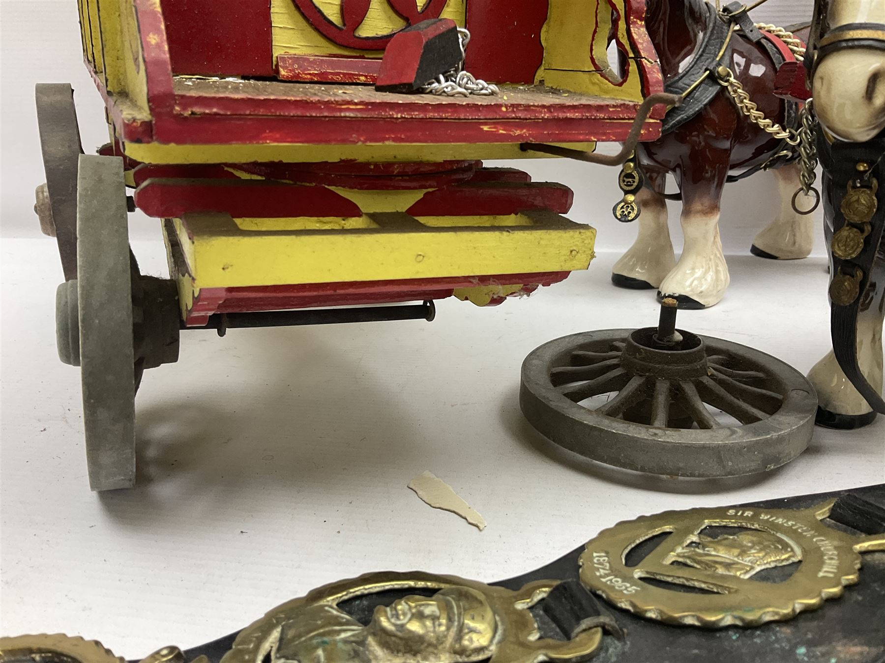 Two ceramic shire horse and gypsy caravans, together with horse brasses 