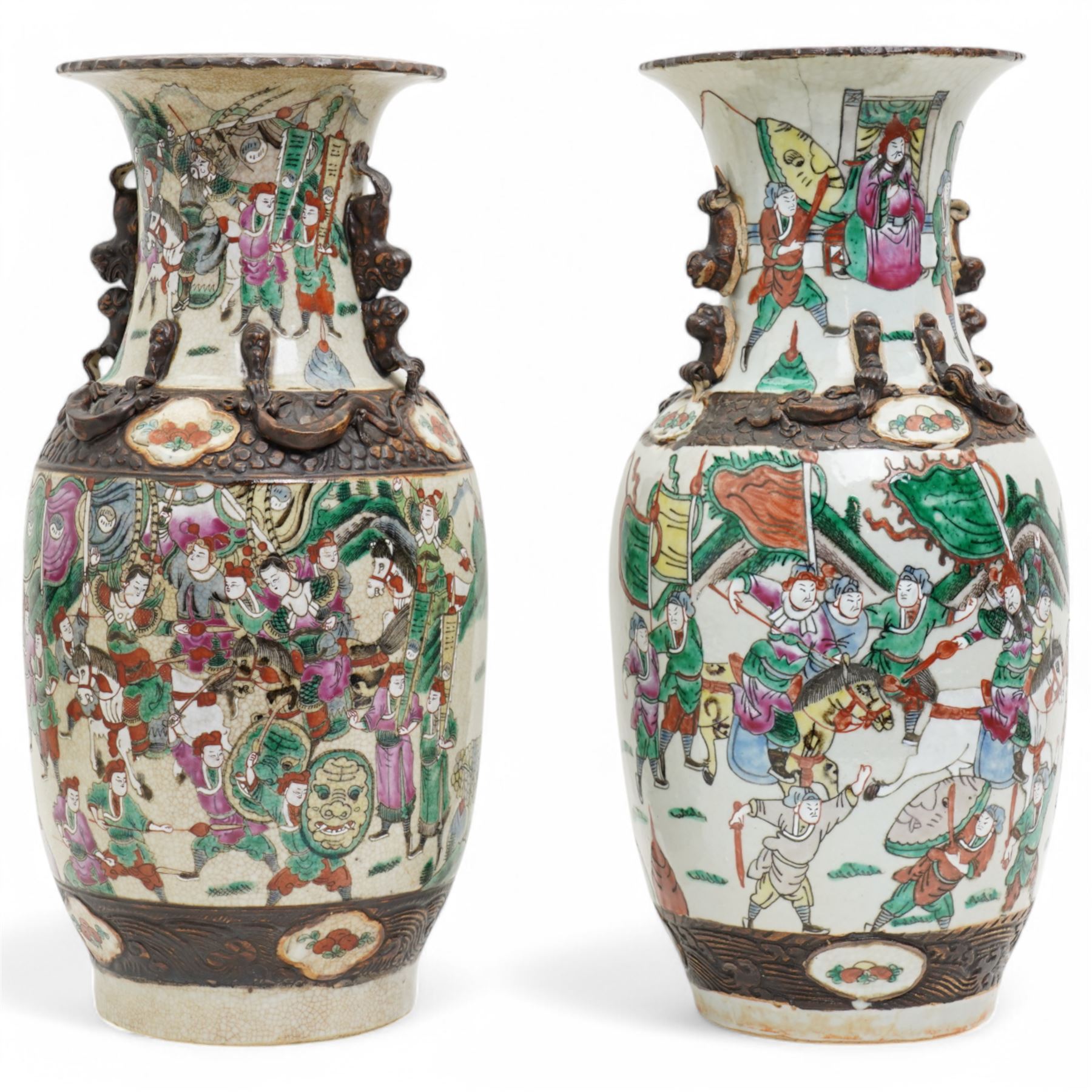 Pair of late 19th/Early 20th century Cantonese baluster vases decorated with warriors and mythical beast handles on a white ground H44cm 