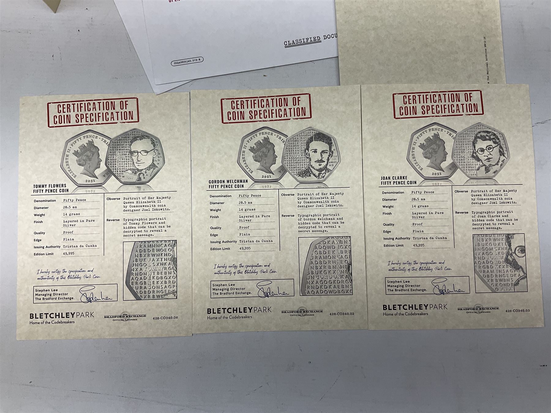 Queen Elizabeth II Tristan Da Cunha 2021 Bletchley Park seven coin set, including 'Bombe Machine' 9ct gold coin weighing 2.75 grams, housed in a presentation folders with certificates