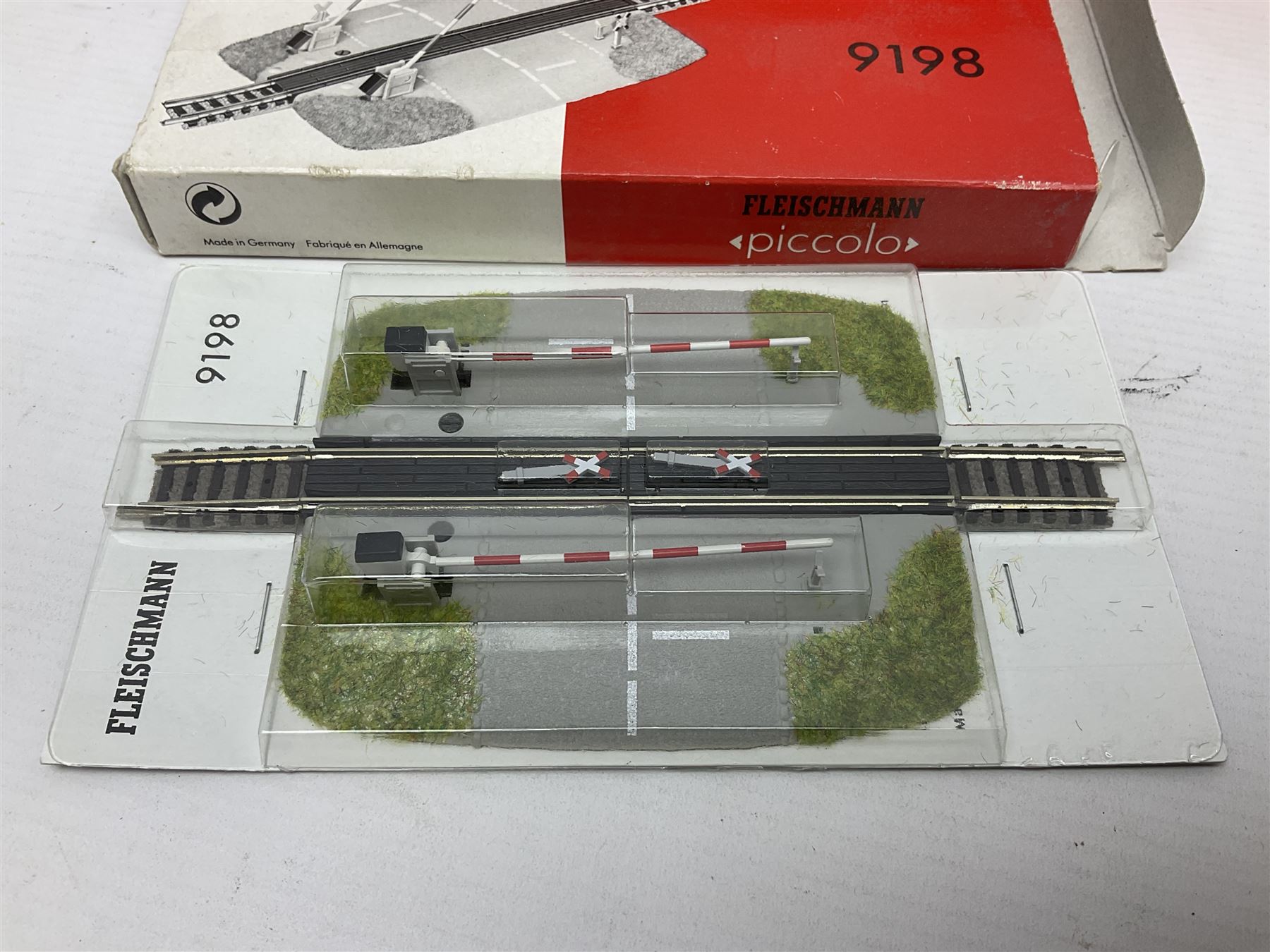 Fleischmann 'N' gauge - four-car set with double pantograph locomotive, dummy and two double decker coaches; No.825201 'Piccolo' three-piece wagon set; No.9198 'Piccolo' level crossing; No.9171 'Piccolo' points; and  No.KN35 Girder Bridge; all boxed