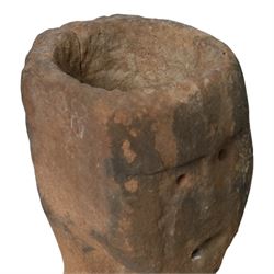 Sandstone carving, modelled as a stylised anthropomorphic head with simple facial features, H30cm