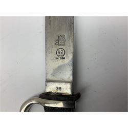 German Hitler Youth dagger the 14cm steel blade by Eickhorn Solingen inscribed Blut und Ehre and marked RZM M 7/66, chequered black grip with inset enamel diamond shaped insignia; in steel scabbard with leather frog L27cm overall