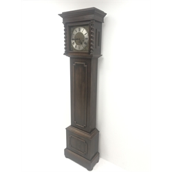 Early 20th century oak longcase clock, brass dial with silvered Roman chapter ring, triple train driven quarter chiming movement on six gongs, the trunk door decorated with canted split mouldings, H189cm (with pendulum)