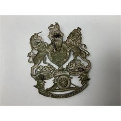 Artillery helmet plate, queen's crown crest, the bottom ribbon marked 'East York Artillery' with three fixing eyes verso H10cm