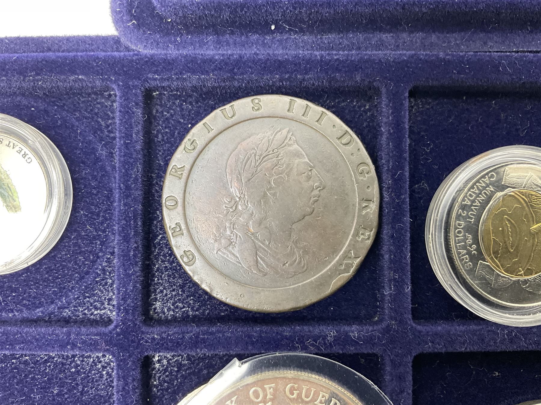 Commemorative, fantasy and other coinage, including George II 1754 farthing, George III 1773 farthing, cartwheel penny and cartwheel two pence, Queen Victoria Canada 1886 twenty five cents, various commemorative crowns etc, housed in three blue coin trays