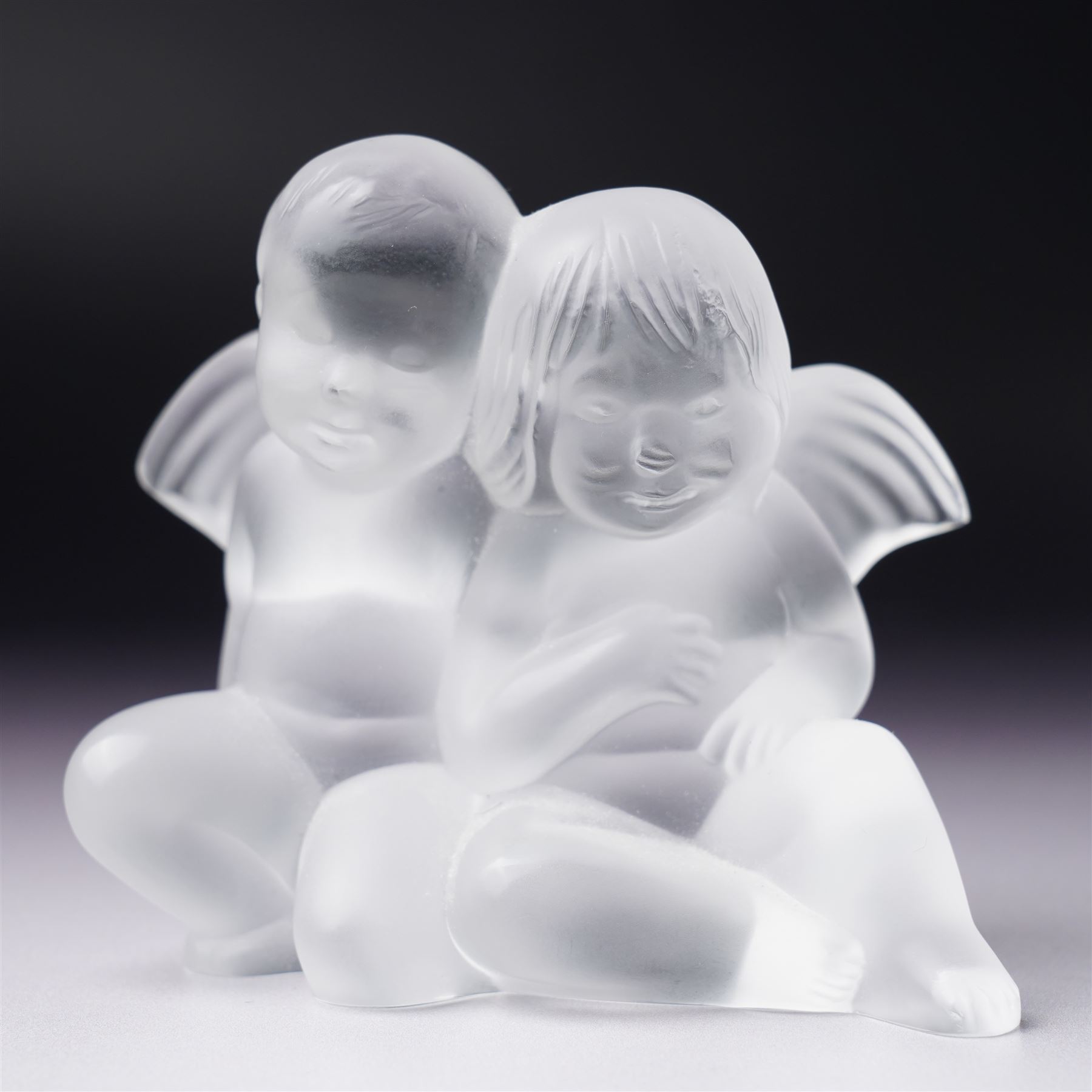  Lalique frosted glass figure of two cherubs  H8cm and another of two doves H4cm, both marked 'Lalique, France' (2)