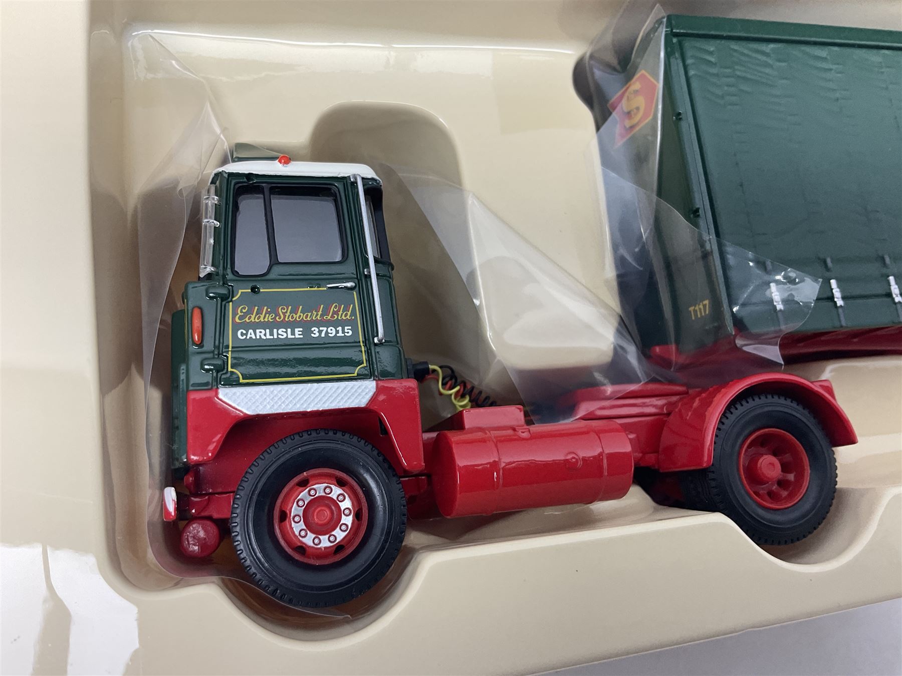 Corgi Eddie Stobart - three limited edition lorries; two Hauliers of Renown - CC13415 MAN TGA XXL Curtainside and CC14002 Volvo FH Curtainside; and  CC12607 Scammell Crusader Tautliner; all boxed (3)