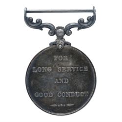 Royal Navy Long Service and Good Conduct Medal awarded to 'Pte H.C Oakman Suffolk Regt', together with a Yorkshire Regiment cap badge