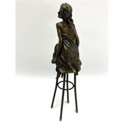 Art Deco style bronze modelled as a bare chested female figure, seated upon a chair, signed 'Pierre Collinet', H27cm