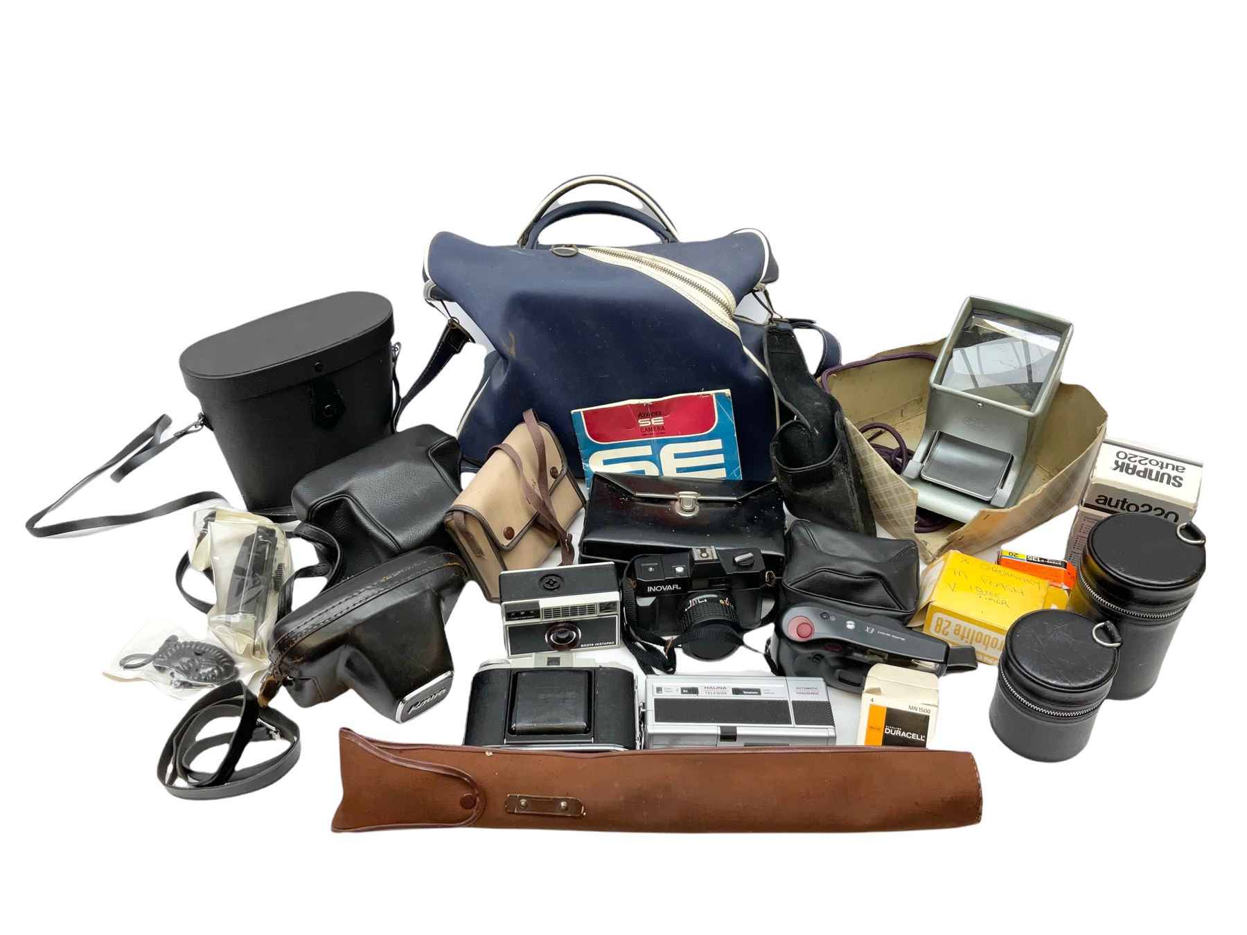 Quantity of Cameras , Lenses and Table Top Viewer- To be assessed 
Collection of cameras, lenses and photography equipment, to include Praktica EE2, Kowa SE, Kodak 66 model II, Inovar, lens Carl Zeiss Jena DDR Flektogon 2.4/35, lens Pentacon Electric f/2.8 135mm, Sunpak auto 2020, tripod  etc, together with a pair of Mark Scheffel 10x50 field binoculars.  