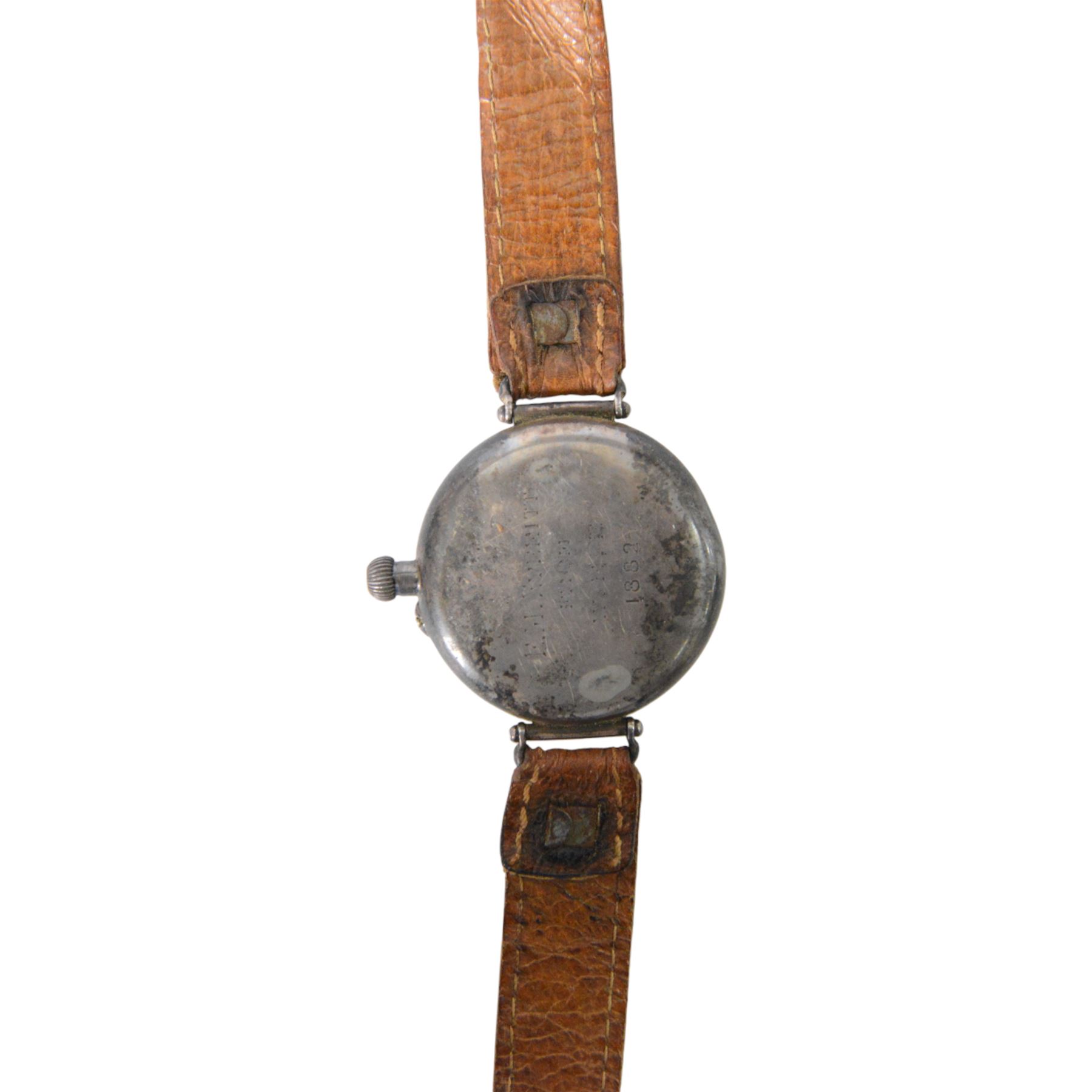 Silver cased trench watch enamel dial with Roman numerals, red XII, Longines movement, used in the Boer war, inscribed to the back 'E M Everitt From W.E Everitt 1882' 