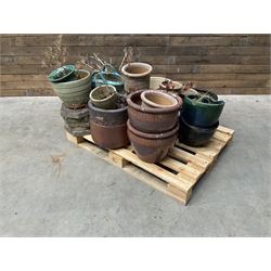 Large collection of ceramic plant pots and paving slabs, (26)