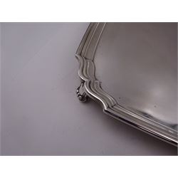 1930s silver tray, of square form with shaped canted corners and stepped rim, upon four bracket feet, hallmarked Frank Cobb & Co Ltd, Sheffield 1936, W31cm