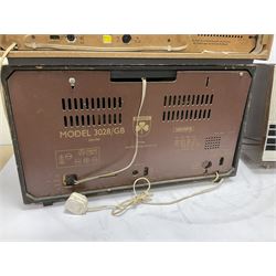 Three mid 20th century radios comprising 1950s Grundig wood cased valve radio model 3028/GB, together with a 1970s Grundig Type RF 153 CS 150 radio in teak case, and an Ekco 355 1960's valve radio, largest W60 H35cm D23cm
