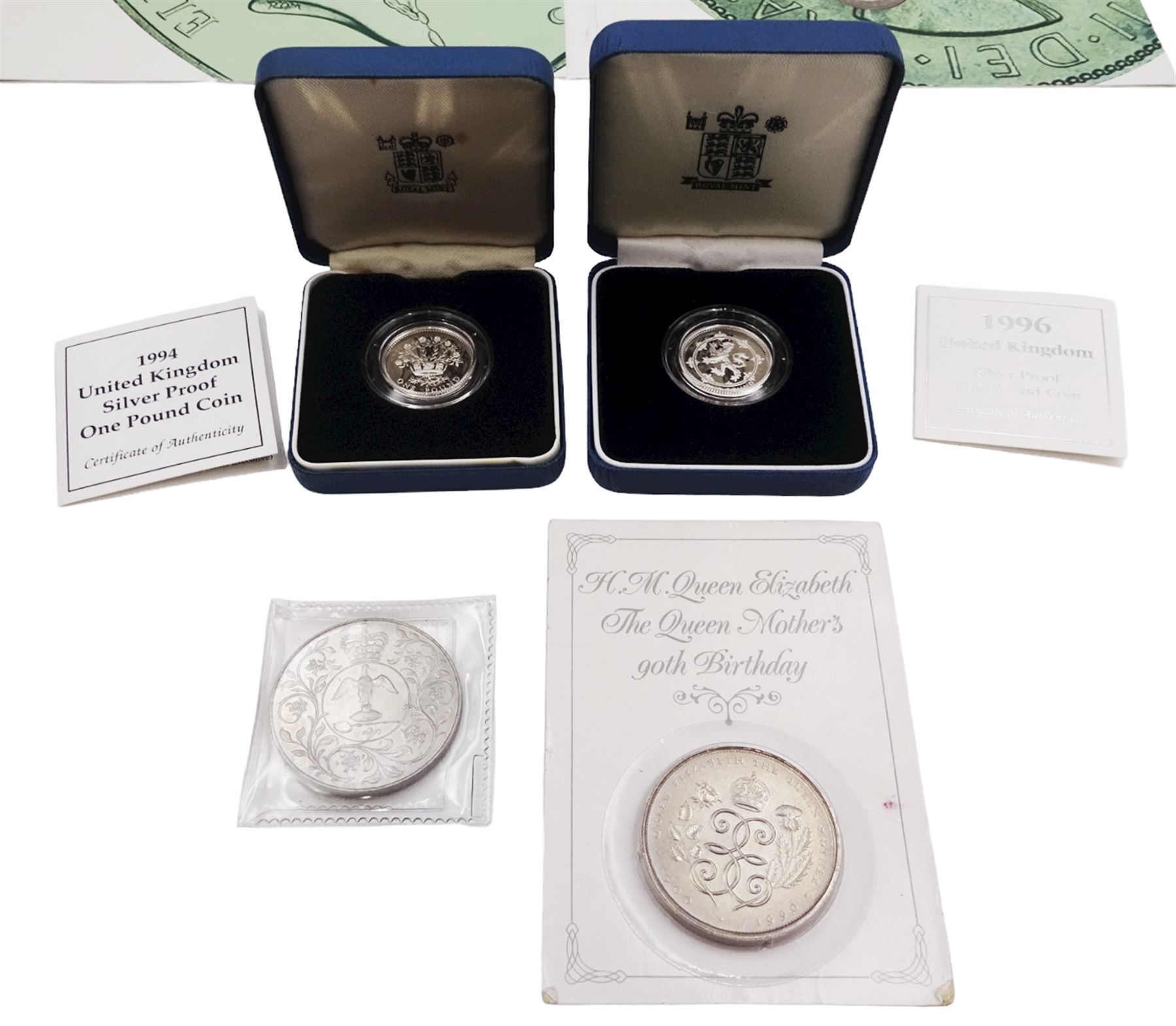 The Royal Mint United Kingdom 1994 proof coin collection, 1994 and 1996 silver proof one pound coins, all cased with certificates, 'From Old Pennies to Decimal Pence' coin set in card folder, etc.