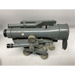 Cooke Troughton & Simms grey painted brass dumpy level in carrying case; and WW2 British .303 Vickers Machine Gun brass Clinometer, stamped 'V.E. 0067' serial No. 2370,  dated 1944 unboxed (2)