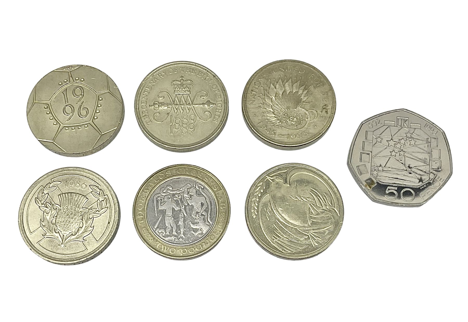 Queen Elizabeth II United Kingdom dual dated 1992/1993 fifty pence coin, five old style two pound coins including 1989 'Bill of Rights' etc and an Isle of Man 2002 two pound coin (7)