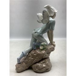 Lladro Privilege figure, Prince of Elves, modelled as an elf with wings leaning upon a rock, with original box, no 7690, year issue 2001, year retired 2003, H23cm