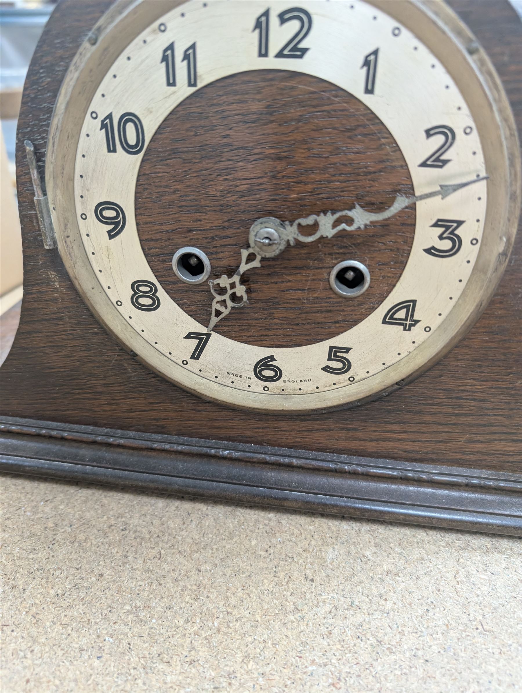 Two wooden mantel clocks, including Elliott example and a brass cased Holosteric Barometer