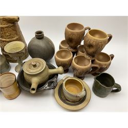 Studio pottery, to include Borgh pottery twin handled bowl, Hillstonia naturalistically modelled jug, set of seven mugs, jug and two vases.