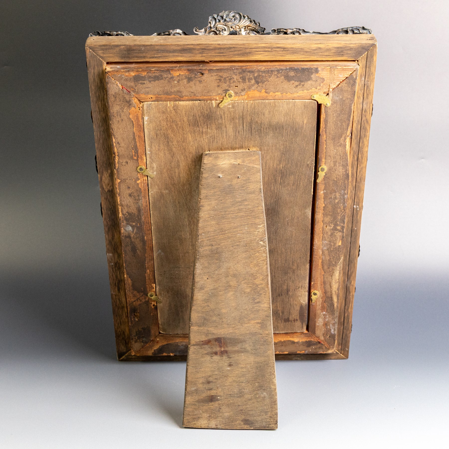 Edwardian silver mounted photograph frame, of rectangular form embossed with scrolling floral and foliate decoration, with easel support verso, hallmarked Henry Matthews, Chester 1905, H37cm