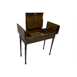 Edwardian oak metamorphic 'Britisher Writing Table', rectangular hinged top revealing correspondence compartments and hinged writing surface with underside storage, flanked by twin hinged compartments with dividers, on turned supports