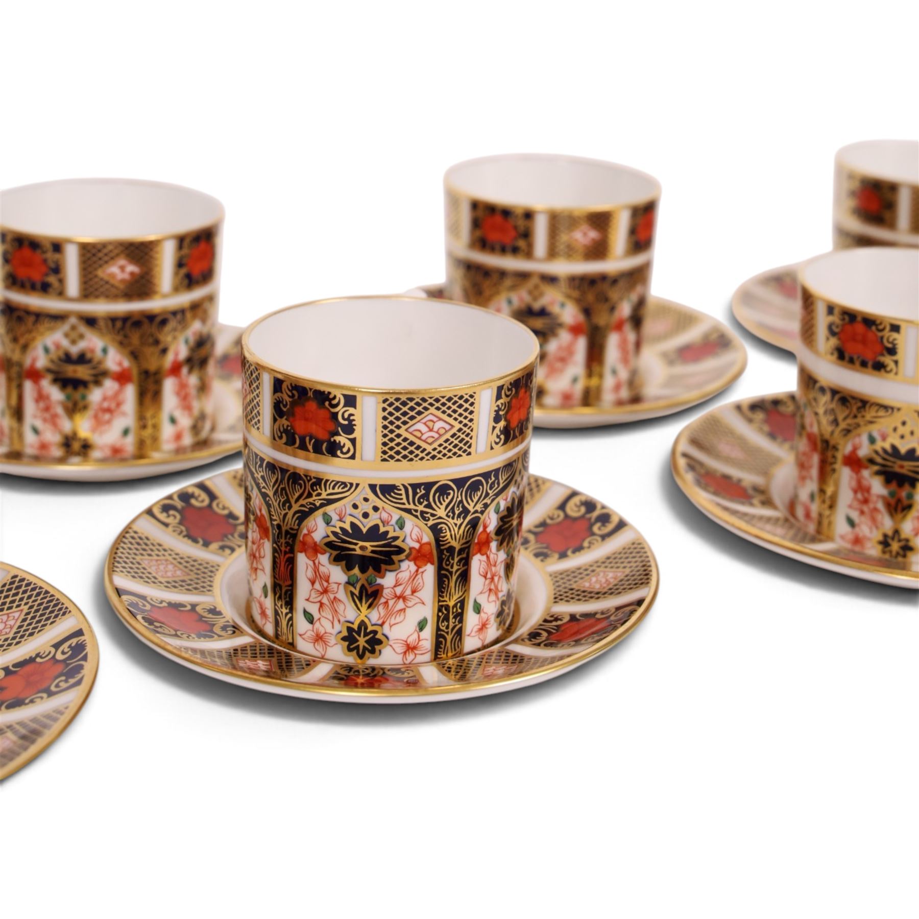 Eight Royal Crown Derby Old Imari 1128 pattern coffee cans and saucers