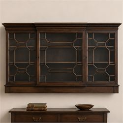 Early 20th century mahogany breakfront wall hanging bookcase, projecting dentil cornice ov...