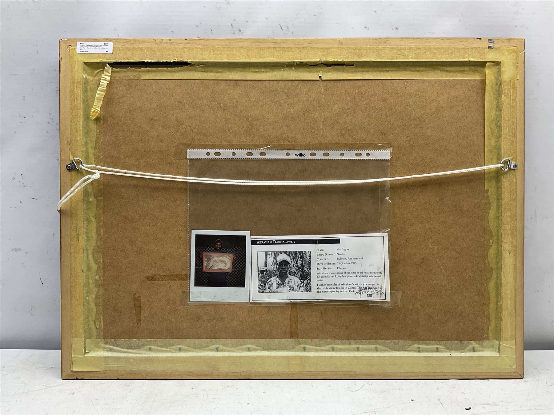 Abraham Dakgalawuy (Arnhem Land Australia 1975-): Aboriginal Abstract Kangaroo, gouache, with polaroid of the artist holding the work verso 35cm x 54cm
Notes: Abraham is the son of the eminent Aboriginal artist Lofty Bardayal Nadjamerrek (1926-2009)