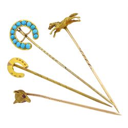 Four Victorian and later gold stick pins including turquoise horseshoe, fox head and galloping horse