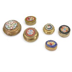 Eight micro mosaic pill boxes, the hinged lids decorated with floral designs  