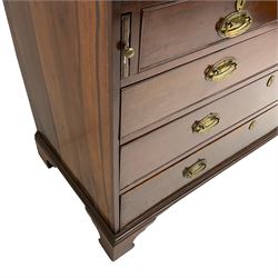 George III mahogany bureau, fall front enclosing interior fitted with pigeon holes, drawers and cupboard, two short and three long cock-beaded drawers below, on bracket feet