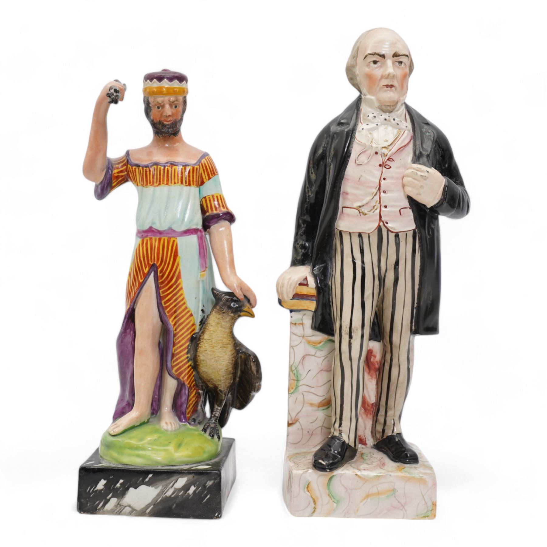 19th Century Staffordshire pearlware figure modelled as Jupiter stood beside a raven, stood upon a faux marble base, painted in bright polychrome enamels, H28cm together with a Staffordshire figure of William Ewart Gladstone (2)