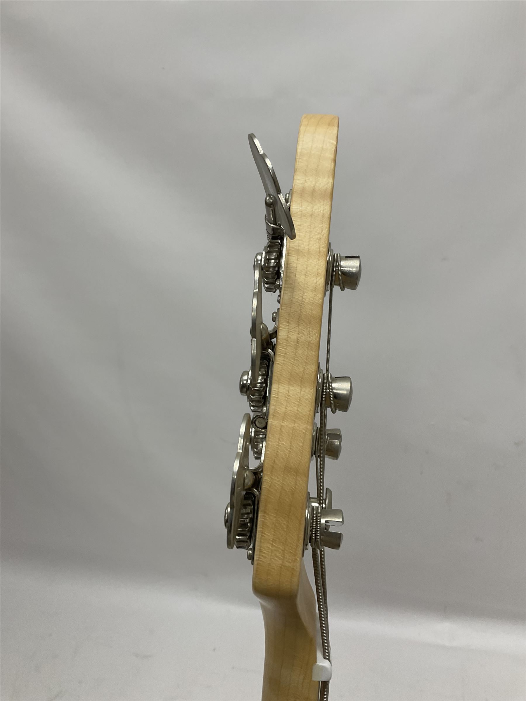 Ernie Ball Music Man Sting Ray 4 string bass guitar, in natural finish with roasted maple neck and tortoiseshell effect scratch guard, serial no 87485, in black Music Man hard case, guitar L114cm