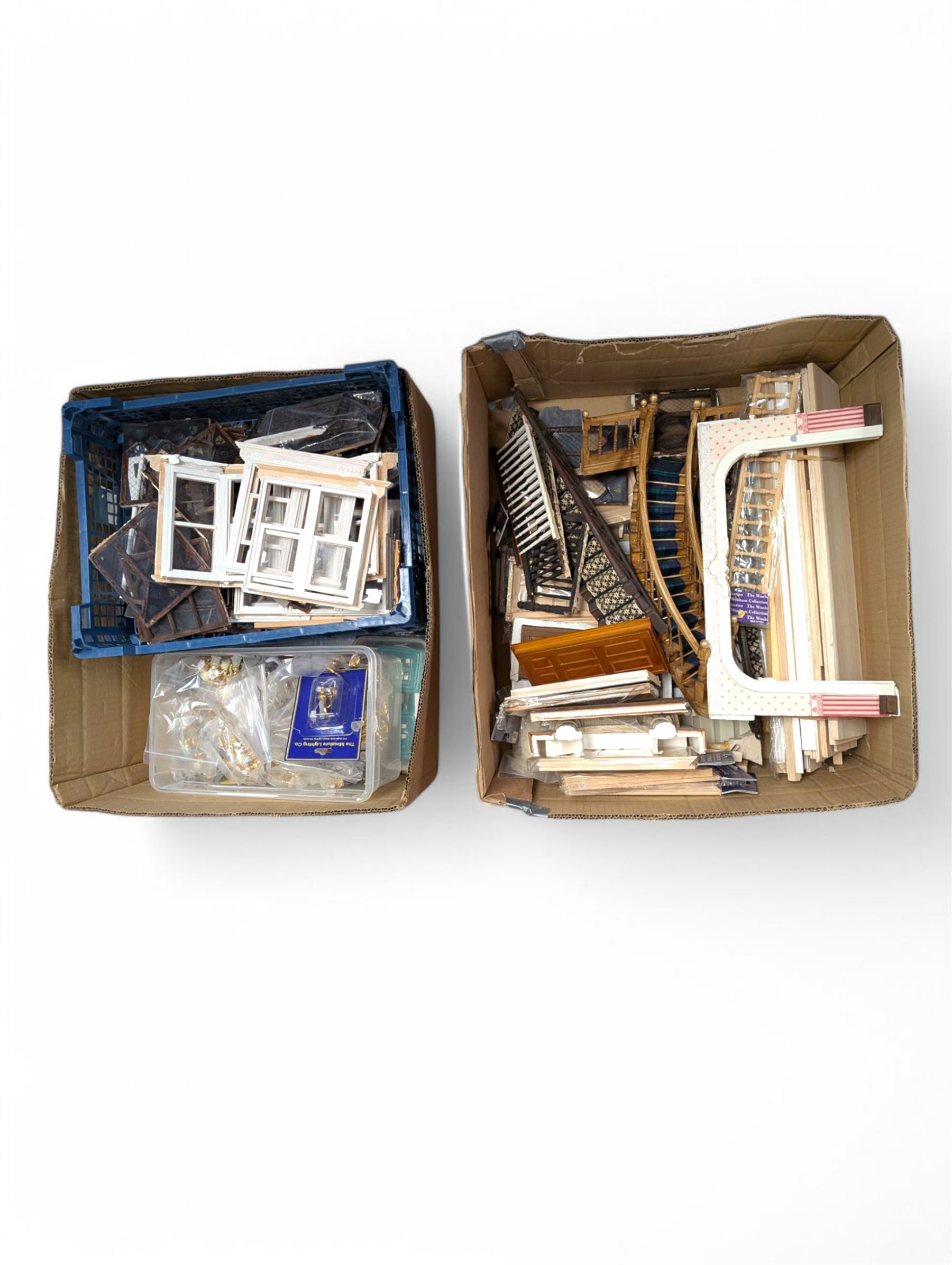 Dolls House building accessories, including three stair cases, a quantity of doors and windows, skirting board, coving, kitchen and fireplaces scenes and a collection of wired and non wired light fittings