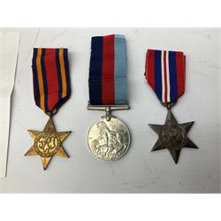 WWII group of three medals comprising war medal, The Burma Star and The 1939-1945 Star with paper slip 