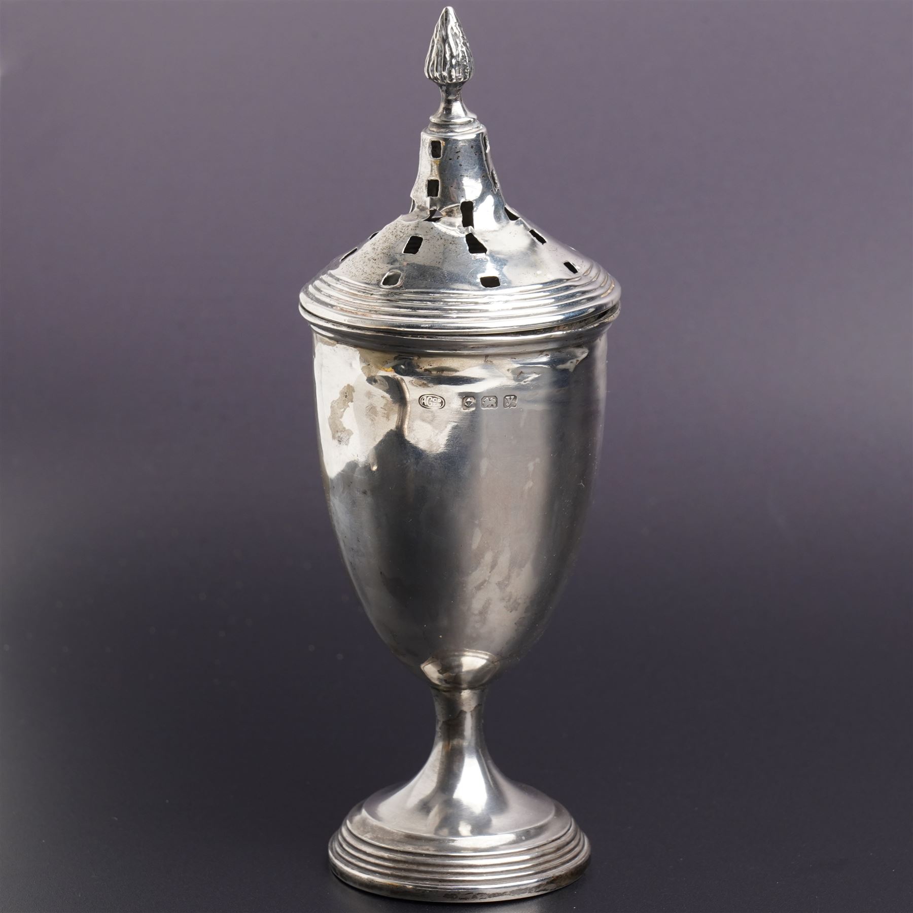 Silver urn shape sugar caster on pedestal foot Birmingham 1923, engraved silver vesta case and asilver pepperette