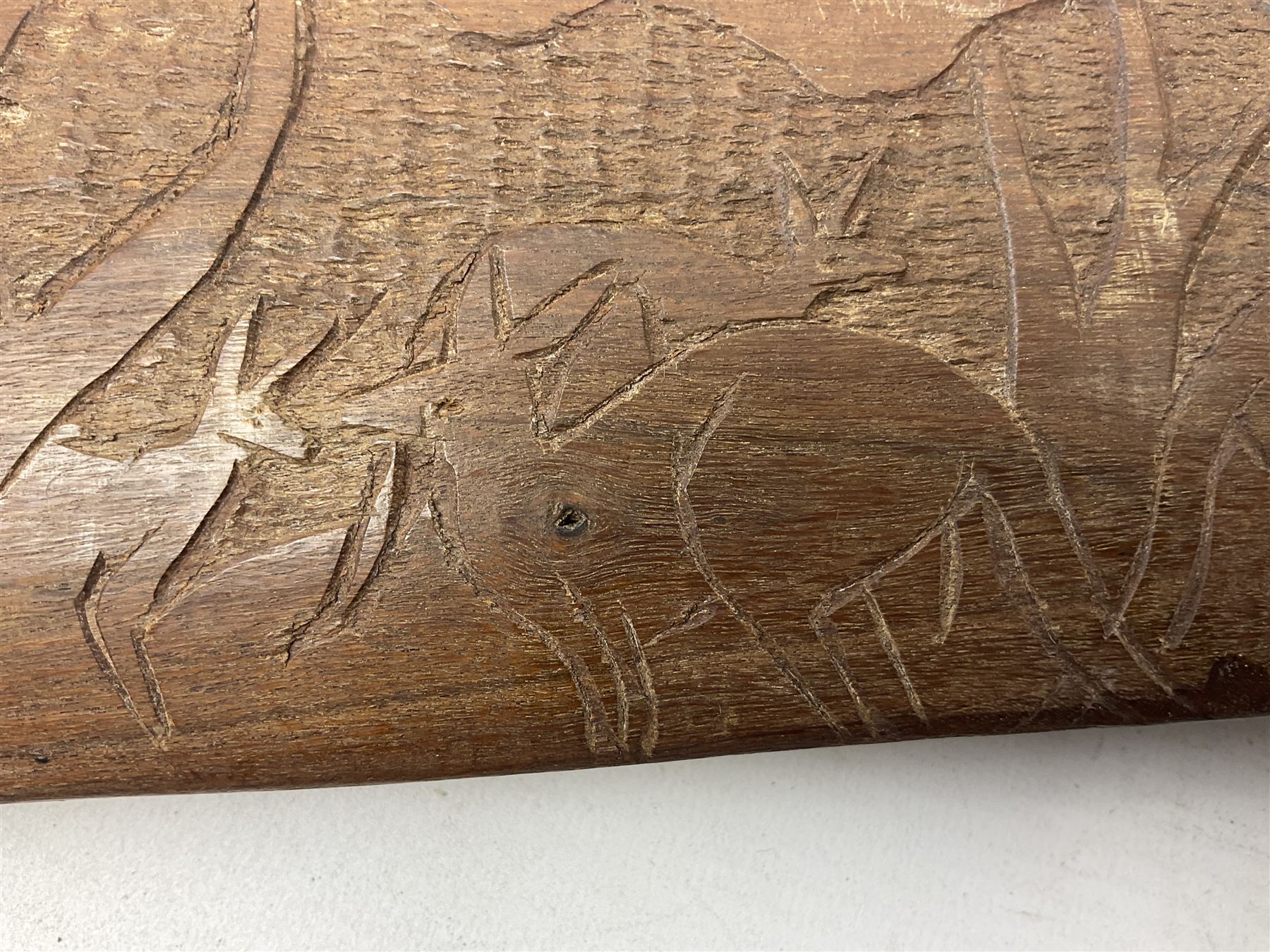 Australian Aboriginal shield, carved with Kangaroo and Emu, 74.5cm; Spear painted with aquatic creatures 78cm, and Spear thrower 81cm (3)