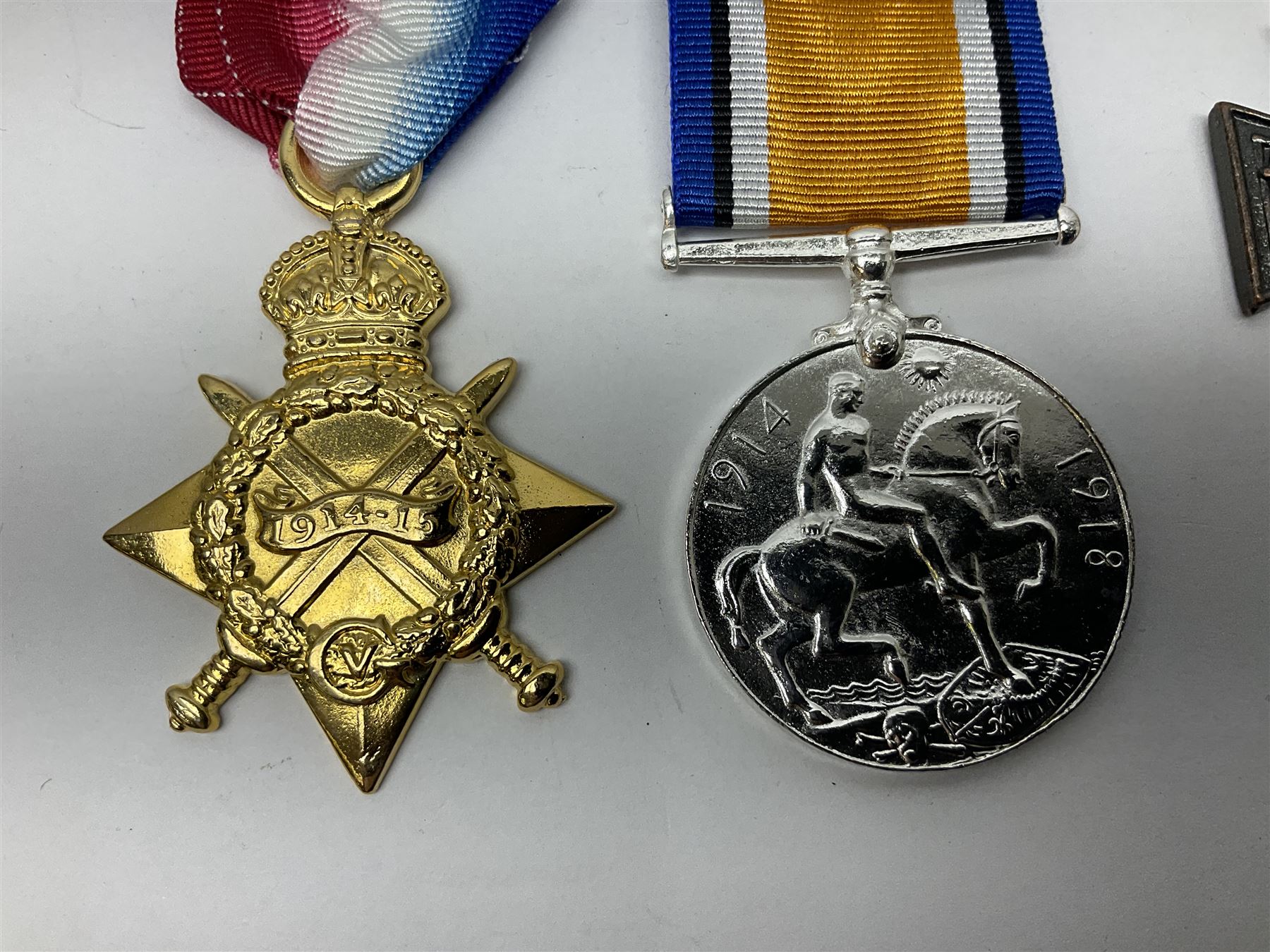 Gaunt & Son Territorial Force Nursing Service cape medal; cased; WW1 British War Medal and 1914-15 Star (names erased); two MID oak leaves; Polish and American medals; eight replica medals including VC, MM, Air Crew Europe Star etc and replica group of five WW2 miniatures etc