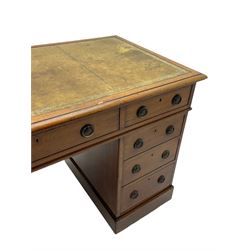 Howard & Sons. - 19th century walnut twin pedestal desk, moulded rectangular top with tooled leather inset, fitted with nine drawers with circular pressed brass handle plates decorated with urns, each drawer fitted with a 'Hobbs, London' lock, on plinth base, the upper right-hand drawer stamped 'Howard & Sons, Berners St.' and with paper label