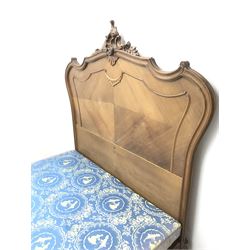 French walnut 4’ 6” double bedstead, the headboard with carved leaf and shell cartouche above segmented veneer panels, shaped foot board with floral carved mount, acanthus cabriole feet, with box base